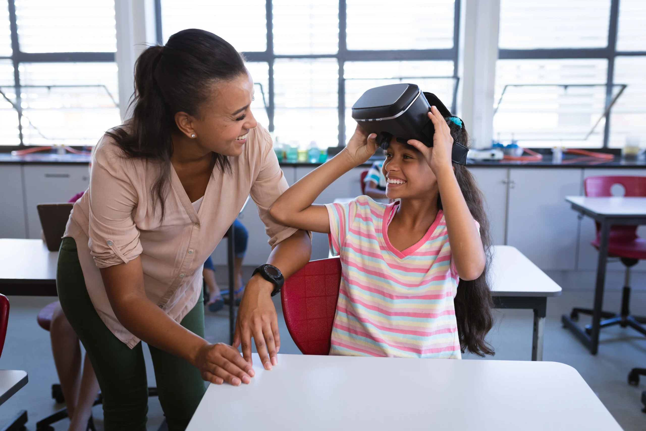 A Boy reaches for something in the virtual world he is interacting with in virtual reality.